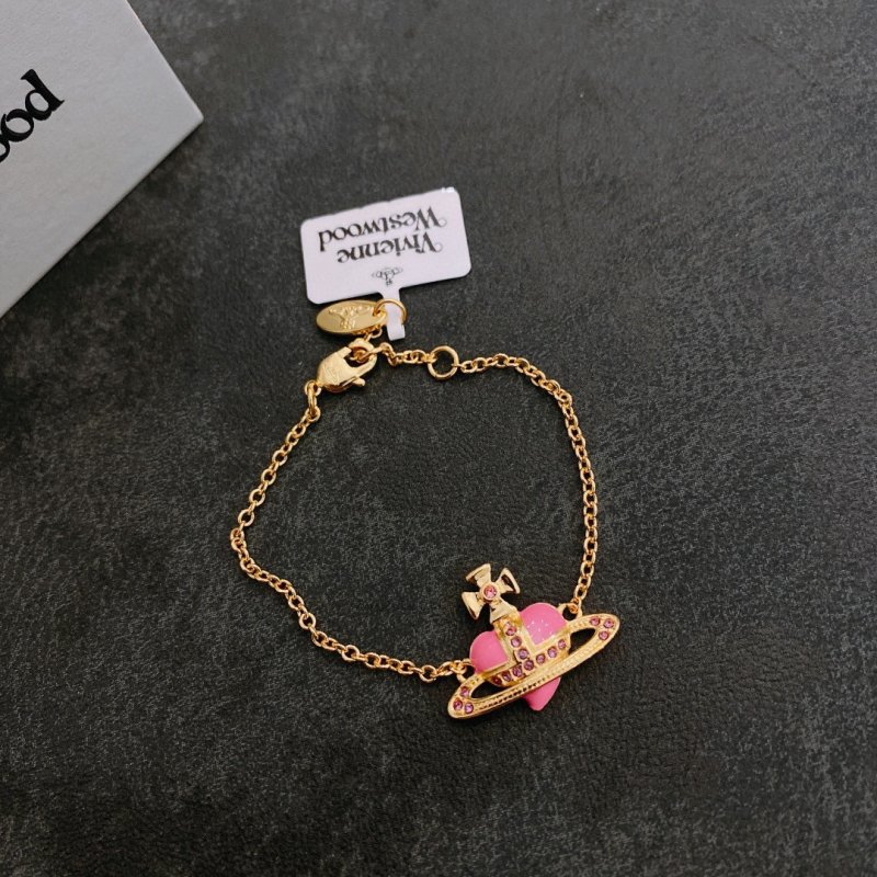 Vivienne Westwood Saturn Gold Chain Bracelet with Pink Stone view