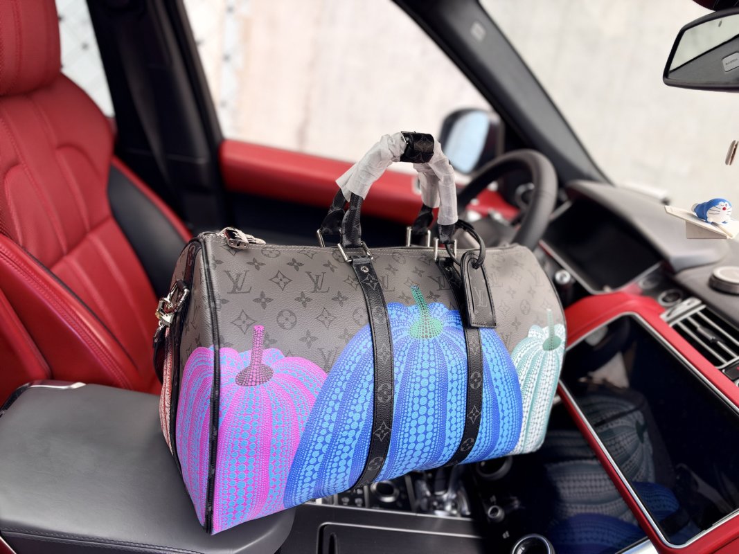 Louis Vuitton Keepall 45 x Yayoi Kusama Pumpkin Monogram Travel Bag view