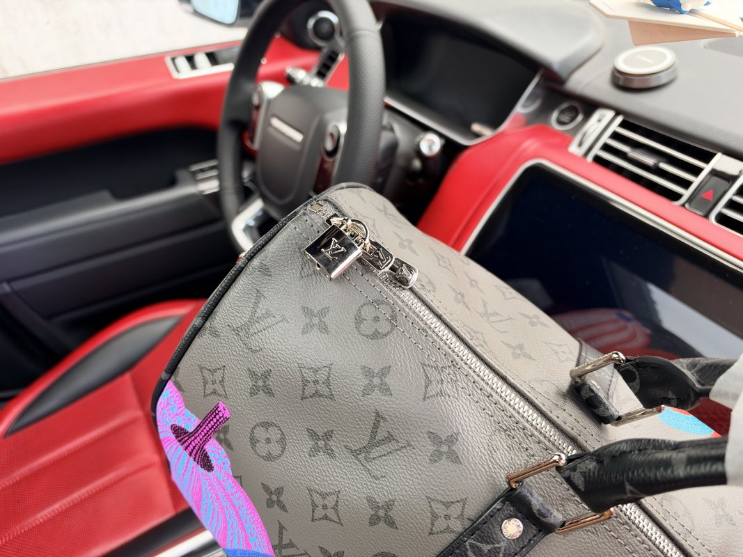 Louis Vuitton Keepall 45 x Yayoi Kusama Pumpkin Monogram Travel Bag view