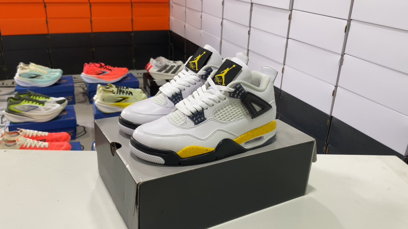 Jordan Air Jordan 4 Retro White Yellow Black Mid-Top Basketball Sneaker
