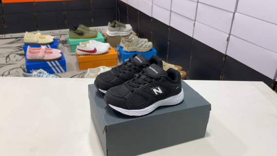 New Balance 408 Kids Black White Low-Top Running Shoe